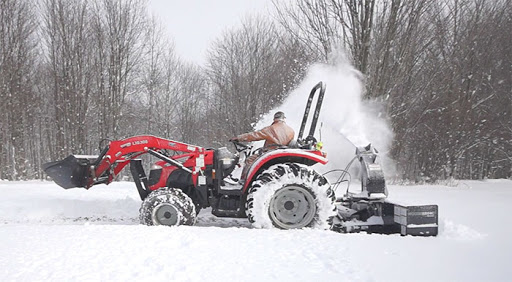 A Beginner’s Guide to Snow Plowing With a Skid Steer
